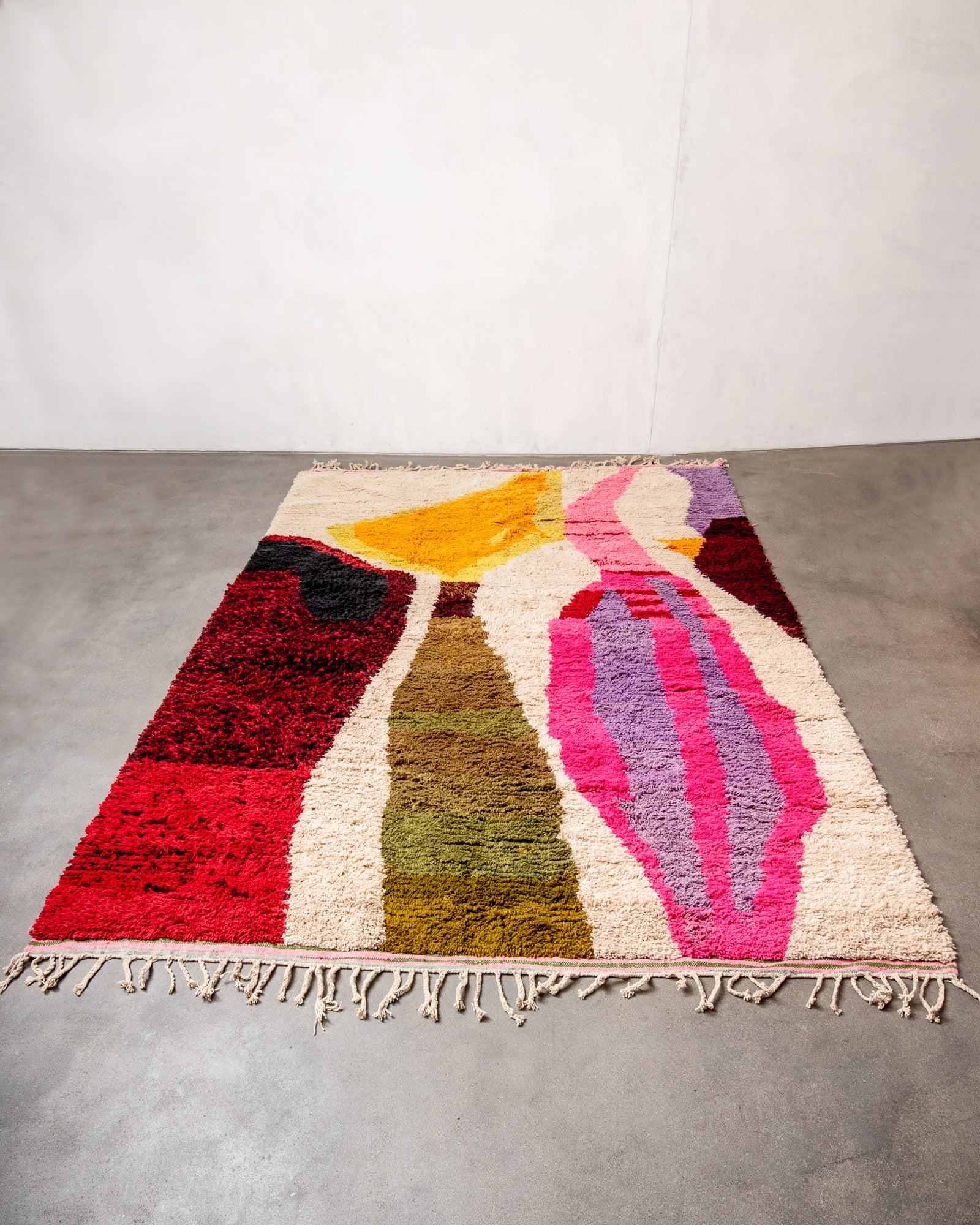 Modern, designer, handcrafted Berber rug from Morocco. Vintage carpet with beautiful colours and patterns and fluffy texture.